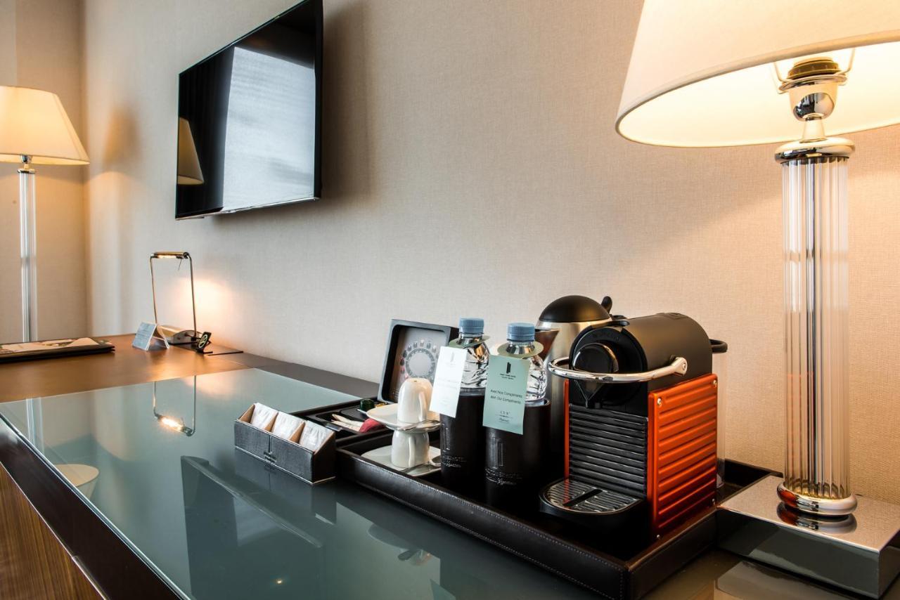 Kenzi Tower Hotel Casablanca Bagian luar foto A Nespresso machine in a hotel room